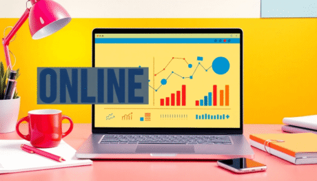 Modern workspace with laptop showing abstract graphs, surrounded by notebooks, coffee cup, and smartphone, highlighting online course marketing and...